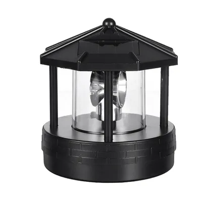 A black solar-powered lighthouse lamp.