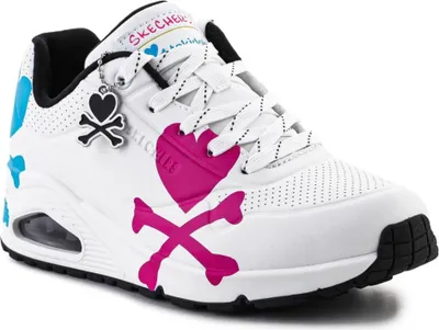 A white Skechers sneaker with pink and blue heart and crossbones graphics.