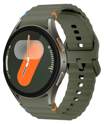 A close-up, studio shot of a smartwatch with a green silicone band.