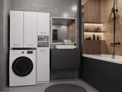 A modern bathroom with a washing machine, cabinets, vanity, sink, and bathtub.