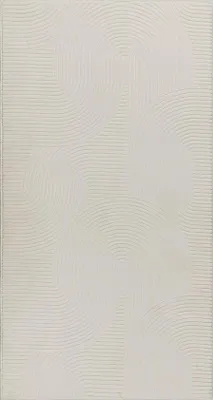 A close-up, full-frame shot of a textured rug with a geometric pattern.