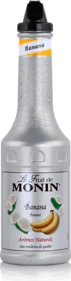 A bottle of Monin Banana syrup on a white background.