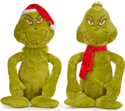 Two plush toys of the character The Grinch are shown against a white background. One is wearing a Santa hat, and the other is wearing a red scarf.
