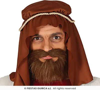 Close-up of a man wearing a shepherd costume.