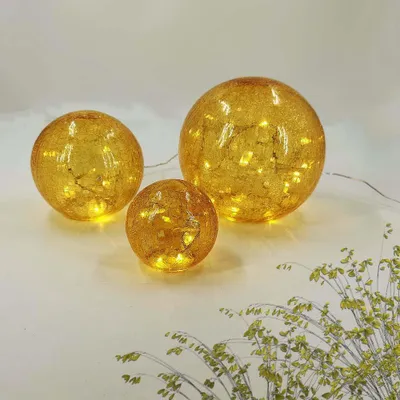 Produktbild von 3x Glas-Kugel mit LED-Beleuchtung Deko-Leuchte FIONA Lichterkette 60 LED-8 Leuchtfunktionen D:10+15+20cm Bruchglasoptik: AMBER