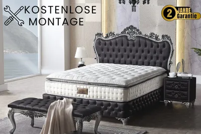 A luxurious bedroom setting featuring a large bed, mattress, and a bench.