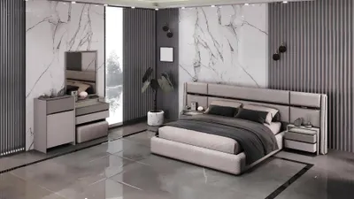 Image de Ensemble de chambre à coucher moderne comprenant un lit, deux tables de chevet et une coiffeuse.