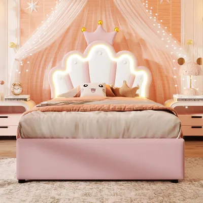 A pink princess-themed bed with a crown-shaped headboard and LED lighting.