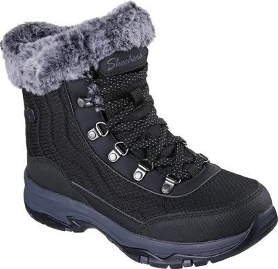 A black Skechers boot with gray faux fur trim.