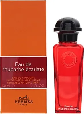 A product shot of a perfume bottle and its packaging.