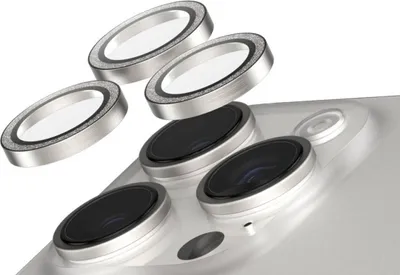A close-up view of camera lens protectors for a smartphone.
