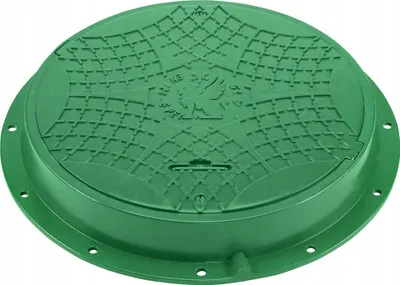 A green manhole cover with a patterned surface and a circular flange with bolt holes.