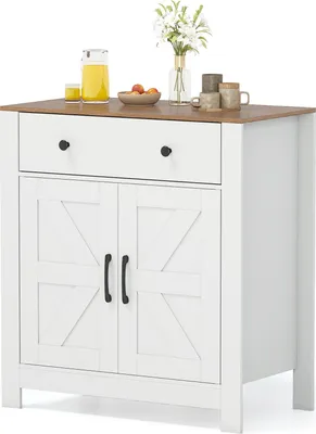 A white sideboard with a brown countertop and two cabinet doors with barn door style detailing.