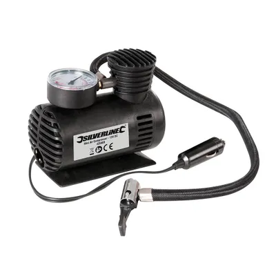 A black mini air compressor with a pressure gauge and a car charger plug.