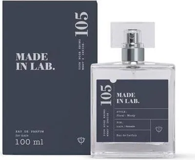 A perfume bottle and its box are displayed side-by-side against a white background.