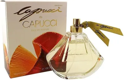 A perfume bottle and its box are displayed against a white background.