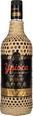 A bottle of Ypioca Cachaça Ouro Reserva Carvalho.