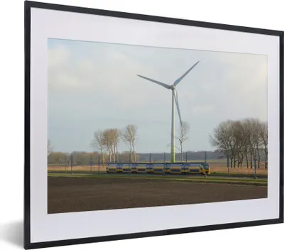 Produktbild von MuchoWow® MuchoWow® Gerahmtes Poster Ein Zug mitten auf der Wiese 40x30 cm - Poster mit zchwarzem Bilderrahmen - Bilderrahmen - Poster im Rahmen