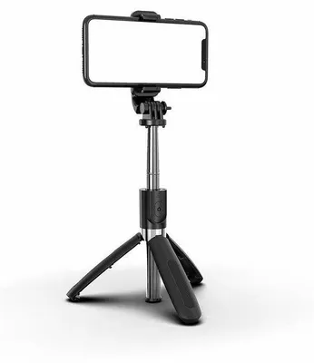 A selfie stick with a tripod base and a smartphone mounted on top, against a white background.