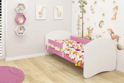 A child's bedroom with a bed and decorative elements.