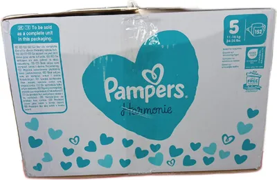 A cardboard box of Pampers Harmonie diapers.