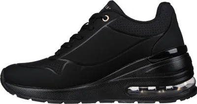 A side view of a black Skechers sneaker with a thick, elevated sole.
