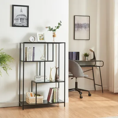 A modern living room or office space with a bookshelf and a desk.
