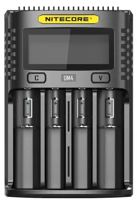 A Nitecore UM4 USB charger with four battery slots is shown.