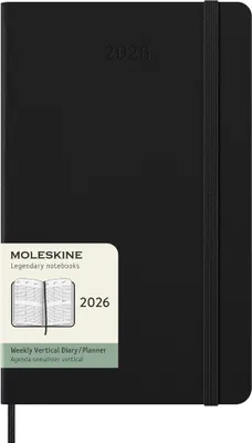 A black Moleskine diary for 2026 is shown closed, with an elastic band holding it shut. A label is attached to the front cover.