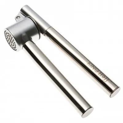 A stainless steel garlic press on a white background.