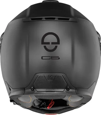 The back view of a black motorcycle helmet.
