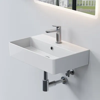 A white ceramic wall-mounted sink with a chrome faucet is shown against a white wall.