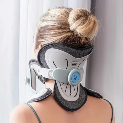 A woman wearing a neck brace.