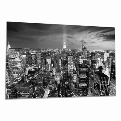 Produktbild von Wallario Herdabdeckplatte aus Glas, Größe 90 x 52 cm 1-teilig, Motiv New York bei Nacht - Panoramablick über die Stadt - schwarzweiß