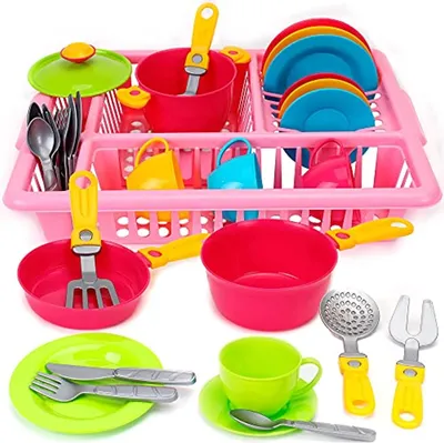 A toy kitchen set with various utensils and dishes arranged in a pink drying rack.
