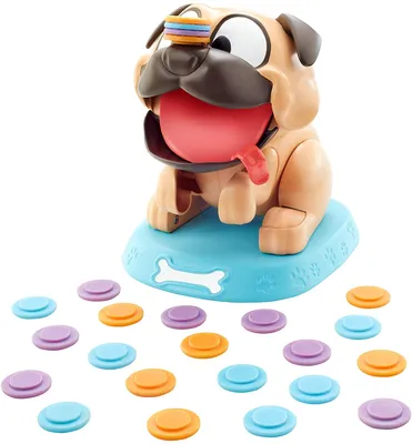 A toy pug with colorful rings on its nose sits on a blue base, surrounded by scattered colorful rings.