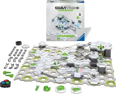 A Gravitrax Power Starter-Set Switch marble run construction toy is displayed with its packaging in the background.