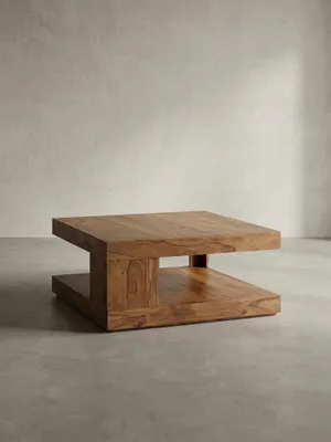 Freigestellte Frontansicht des Design Couchtisches aus Sheesham-Massivholz in Dunkelbraun, der seine klare, quadratische Form und die untere Ablagefläche präsentiert._#sku_BARWL6.227#