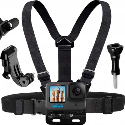 A chest mount for a GoPro camera, along with accessories, is displayed against a white background.