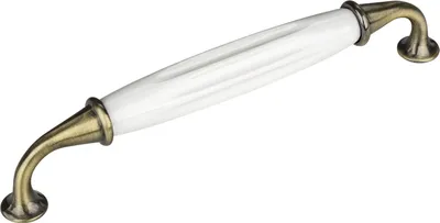 A single cabinet pull with a white ceramic handle and antique brass end caps and screws.