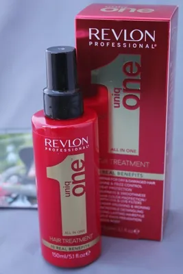A bottle of Revlon Professional Uniq One Hair Treatment and its packaging.
