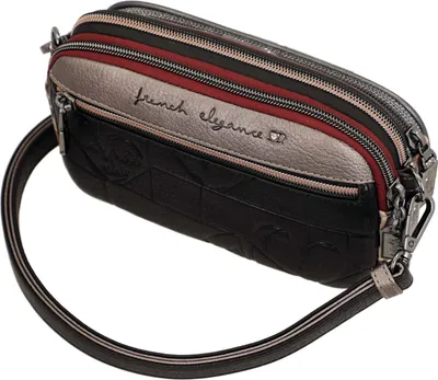 A close-up shot of a black handbag with silver and red accents.