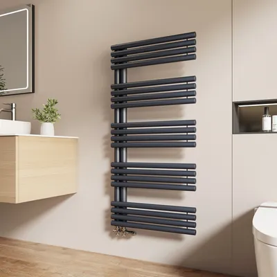 A modern bathroom with a wall-mounted anthracite towel radiator.