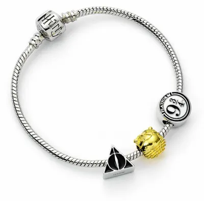 Zdjęcie produktu dla Opaska na ramię Harry Potter Uni  Symbole wielokolorowa Standard