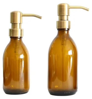 Imagen del producto de Juego de dos dispensadores de jabón: vidrio ámbar con bomba de acero inoxidable, capacidad de 200 + 300 ml
