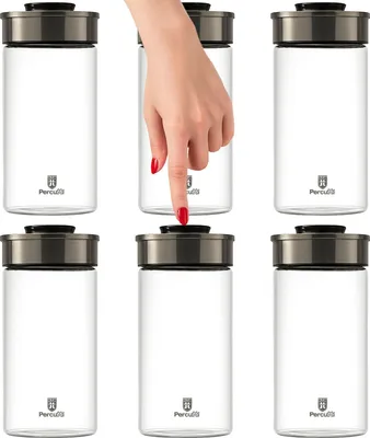 A hand is shown pressing the lid of one of six glass storage jars arranged in two rows.