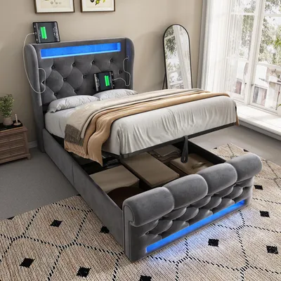 A modern bedroom with a grey upholstered bed featuring integrated LED lighting and storage.