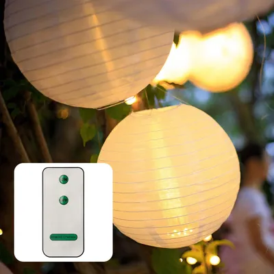 Produktbild von 12x 30cm Lampions outdoor weiß, 12x Batterie LED warmweiß mit Fernbedienung