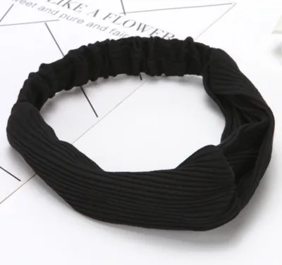 Immagine prodotto di Cerchietto alla moda a costine in tinta unita nel classico nero