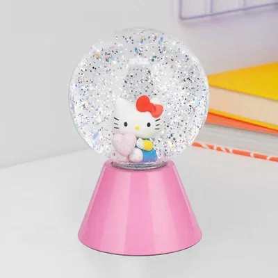 Zdjęcie produktu dla Hello Kitty, lampka LED z brokatem, wysokość: 17 cm / Hello Kitty, kula z brokatem, lampka LED, wysokość: 17 cm